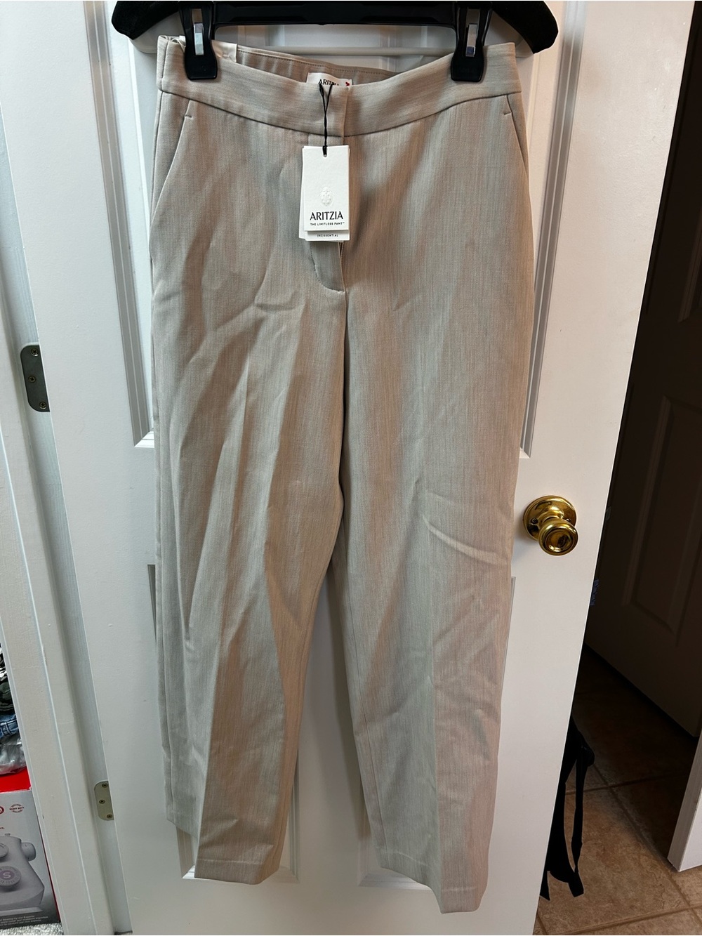 Aritzia Beige High-Rise Trousers
Originally $150